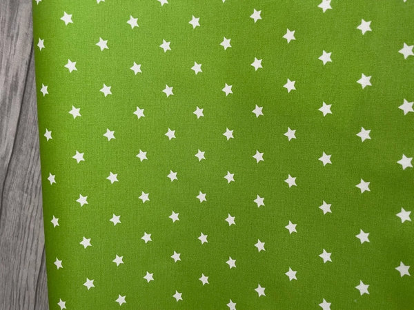 beschichtete Baumwolle Sterne grün hellgrün